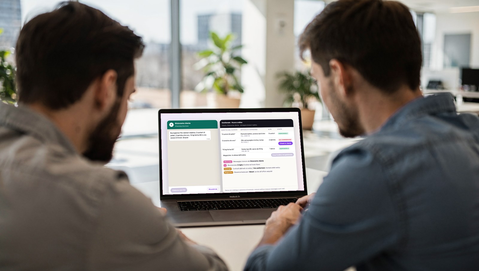 Due persone controllano gli ordini riconosciuti dall'AI prima di confermarli nel gestionale (demo di Scia Digital Studio)